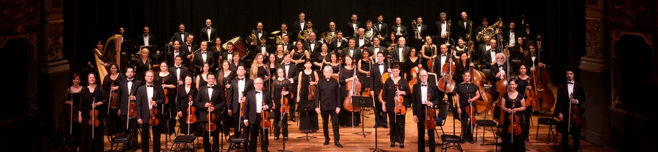 Rādīt visus lietotāja Sinfónica Nacional se une a la Orquesta del Castella para brindar un homenaje a Arnoldo Herrera fotoattēlus
